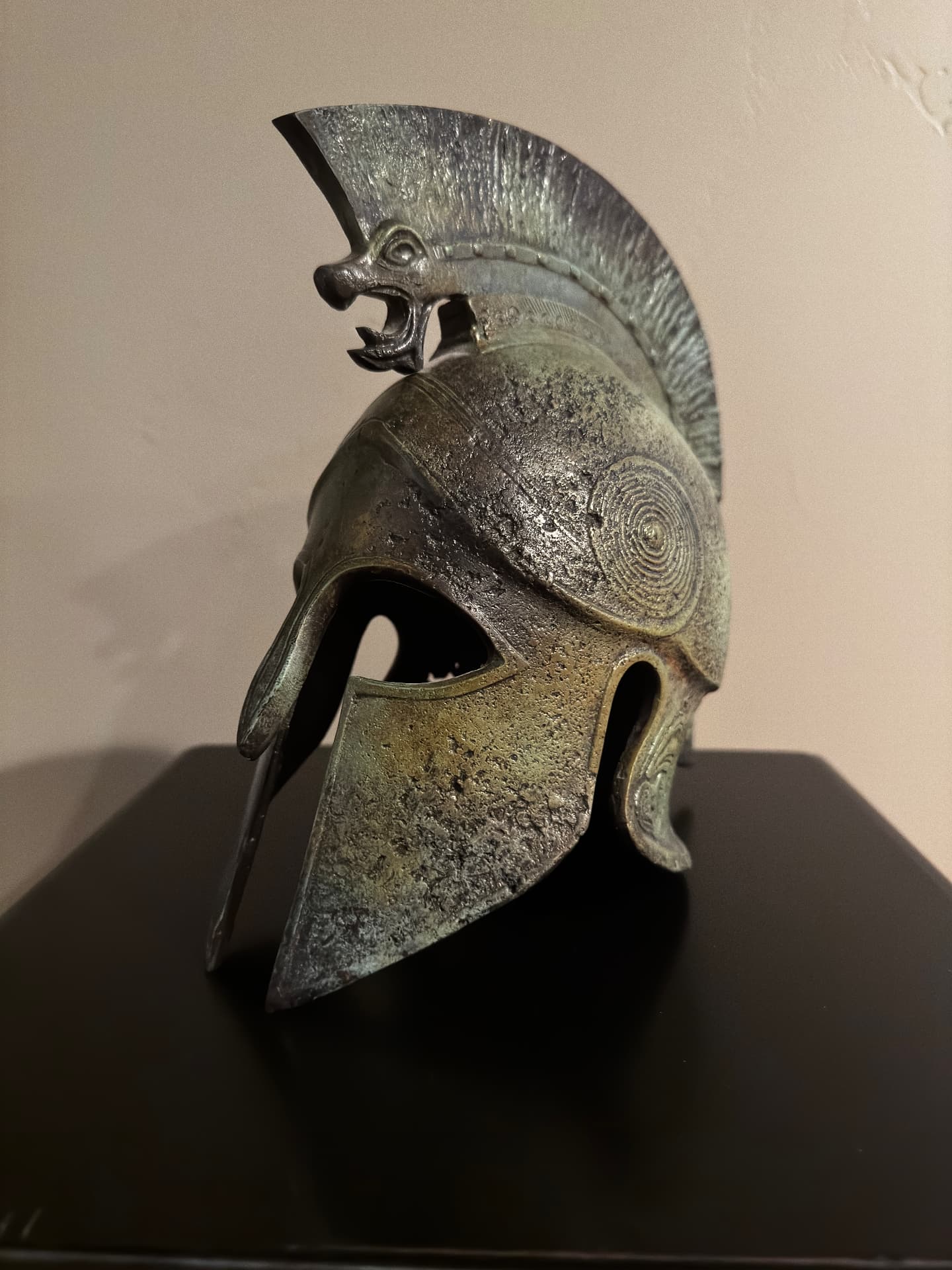 Bronze Corinthian-style Greek helmet with serpent crest, from the author's personal collection.